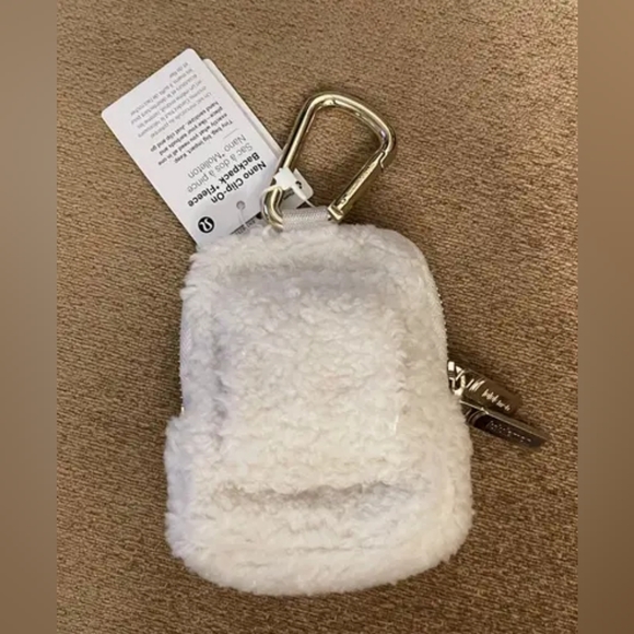 Lululemon Clip On Nano Backpack Ivory Fleece - Picture 4 of 11
